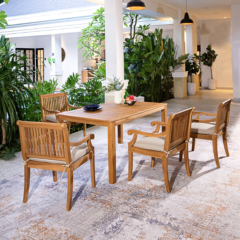 Korie Messer 4 - Person Rectangular Teak Patio Dining Set With Cushions