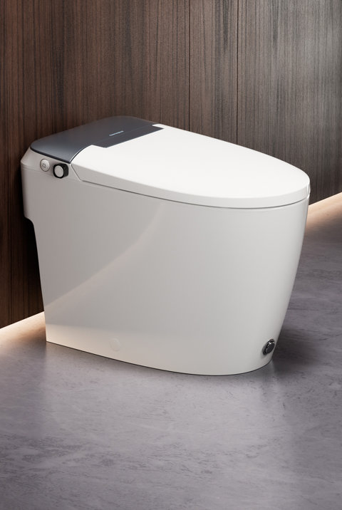 Modern white smart toilet with a sleek, minimalist design and grey lid accent positioned against a wood-paneled wall.