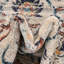 Tapis à motif floral ivoire / bleu marine / jaune / orange Alkire-1254127026