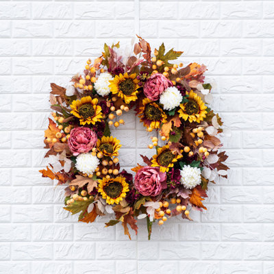 Couronne d'automne élégance pivoine mauve, tournesol doré avec mamans et feuilles d'automne mixtes