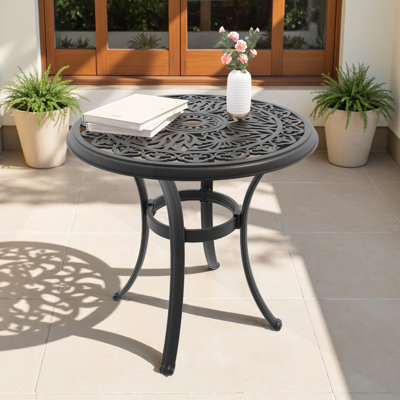 Table de salle à manger de 26,77 pouces en fonte d'aluminium avec un design sculpté élégant et une finition résistante aux intempéries, idéale pour les réceptions à l'extérieur.