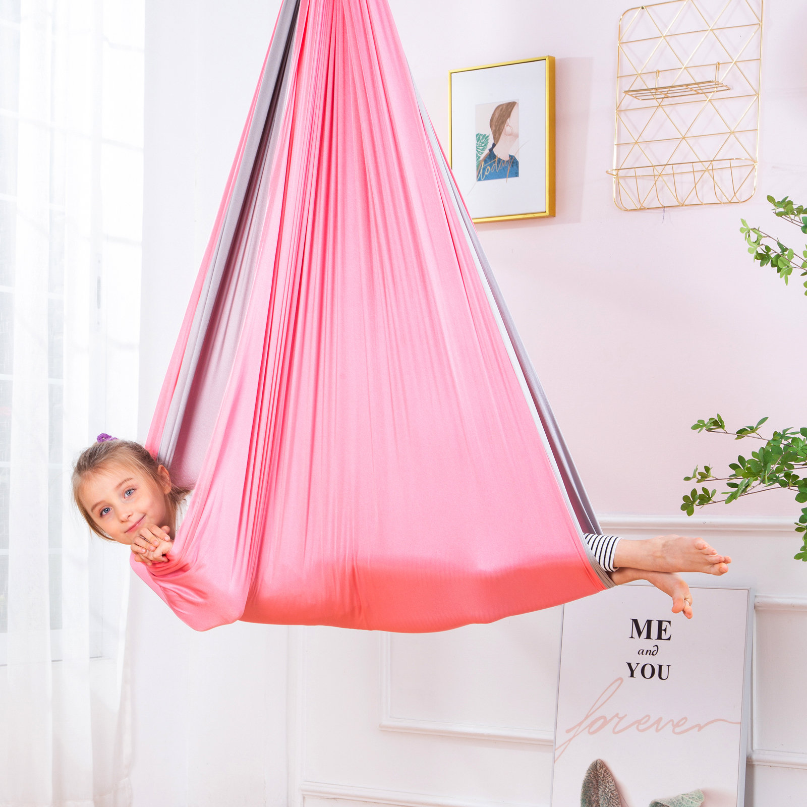 https://assets.wfcdn.com/im/68051440/compr-r85/2287/228732075/livego-fabric-sensory-swing-with-mounting-hangers.jpg
