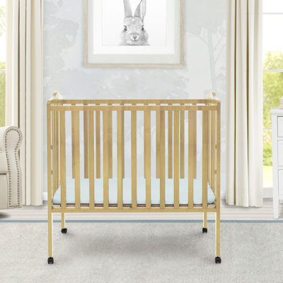 Delta Children Folding Portable Mini Baby Crib with 1.5-inch Mattress, Greenguard Gold Certified