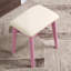 Coiffeuse et tabouret élégants en bois rose pour la décoration intérieure, avec tiroir de rangement, pattes de coiffeuse et plateau rembourré.
