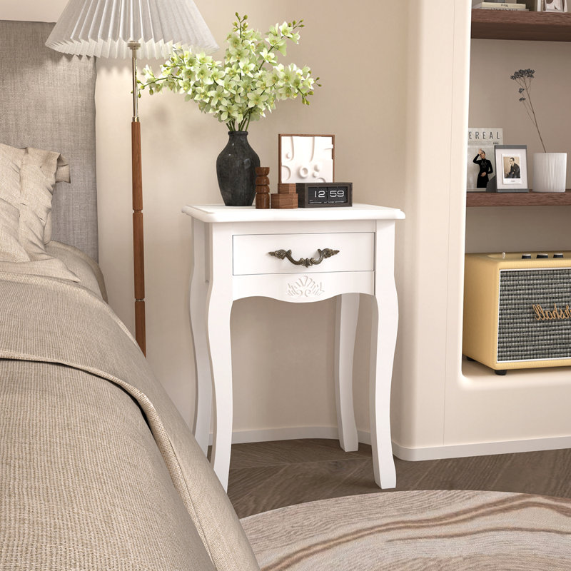 Table de rangement sur pied blanche avec tiroir et 4 pieds courbés