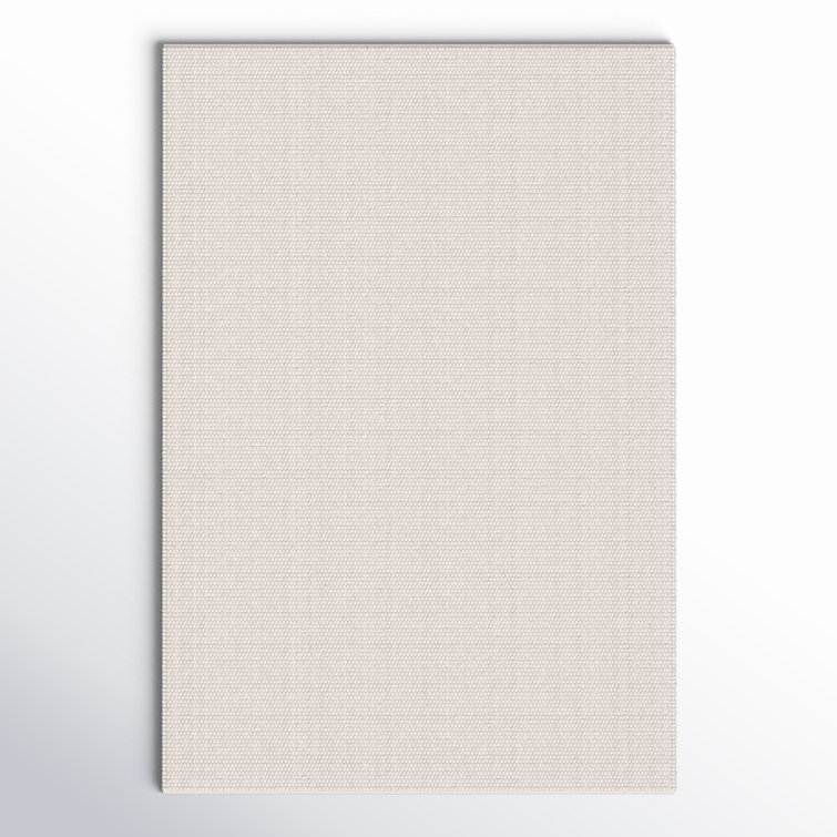 Charvik Solid Color Handmade Area Rug in Ivory
