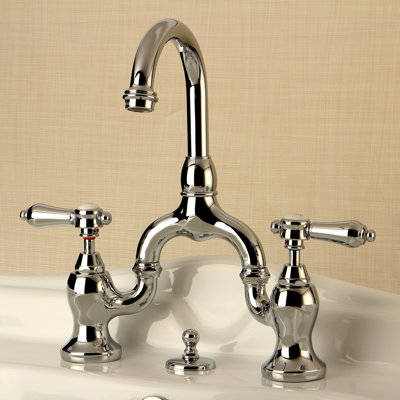 Kingston Brass Heirloom Two-Handle 3-Hole Deck Mount Bridge Bathroom Faucet with Brass Pop-Up