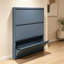 Armoire à chaussures murale en acier avec tiroirs rabattables et grande capacité