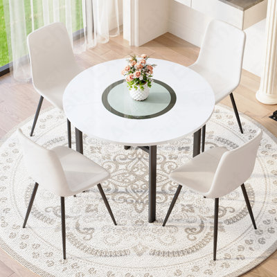 Table And Chair Set.42 Inch Modern Minimalist White Desktop Round Dining Table Set.Paired With 4 White Artificial PU Chairs With Curved Widened Cushion Design.Suitable For Dining Rooms,Office,Etc.