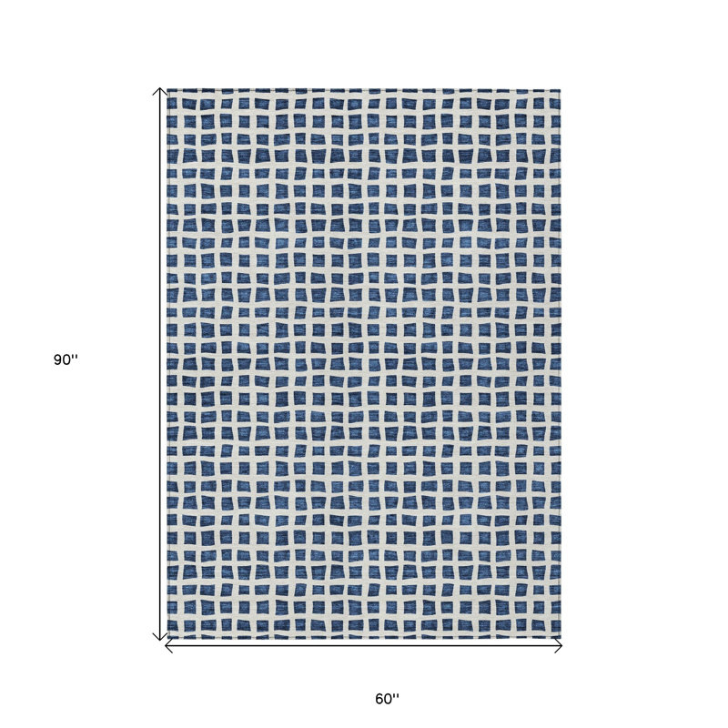 Tapis extérieur lavable géométrique bleu marine et ivoire 5 pi x 8 pi
