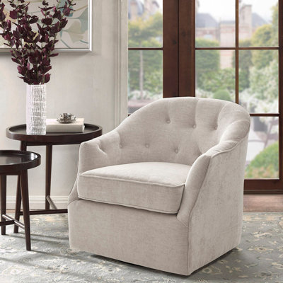 Fauteuil d'appoint courbé et capitonné