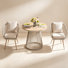 Ensemble repas pour 2 personnes avec table ronde et coussins inclus