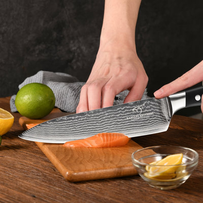 Damascus Steel Chef's Knife, featuring a unique Damascus steel pattern, ultra-sharp blade, and a non-slip handle with three rivets