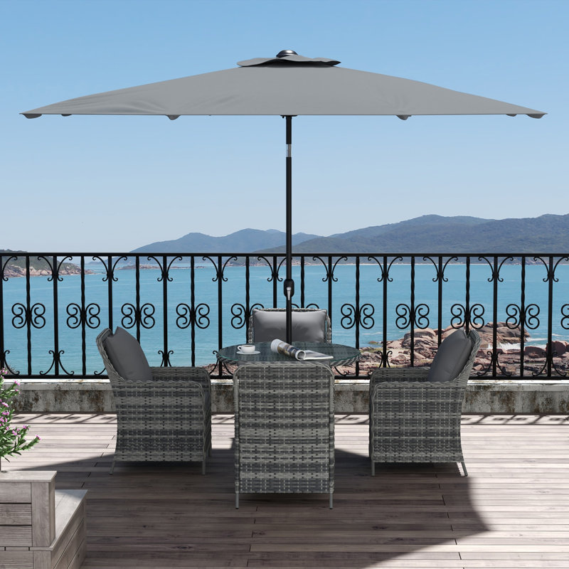 Amukta 4 - Person Patio Dining Set with Rectangular Table , Cushions Included