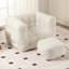 fauteuil à billes avec repose-pieds-64530844