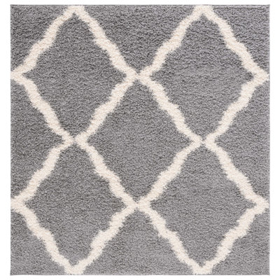 Tapis à poil long en tissu performance à motif géométrique Alonnah
