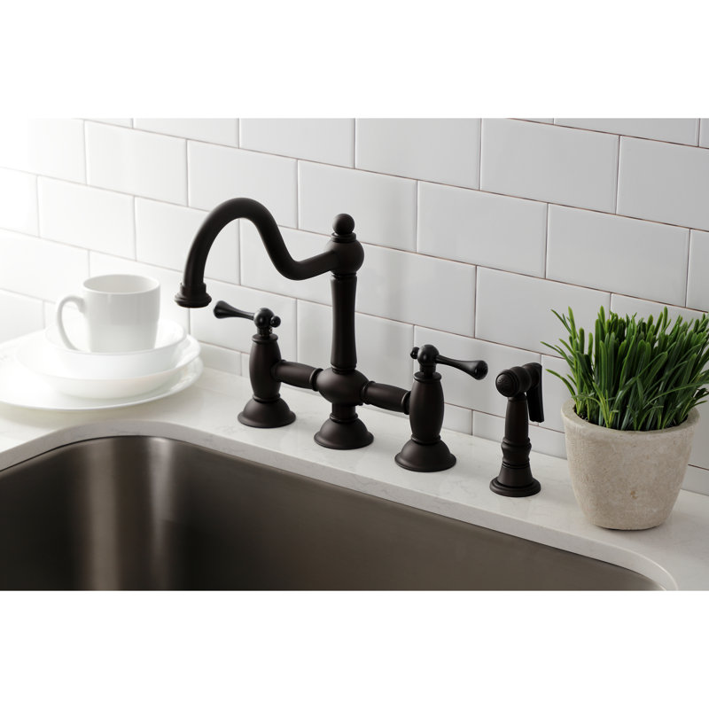 Kingston Brass Restoration Two-Handle 4-Hole Deck Mount Bridge Kitchen Faucet with Brass Side Sprayer, Oil Rubbed Bronze