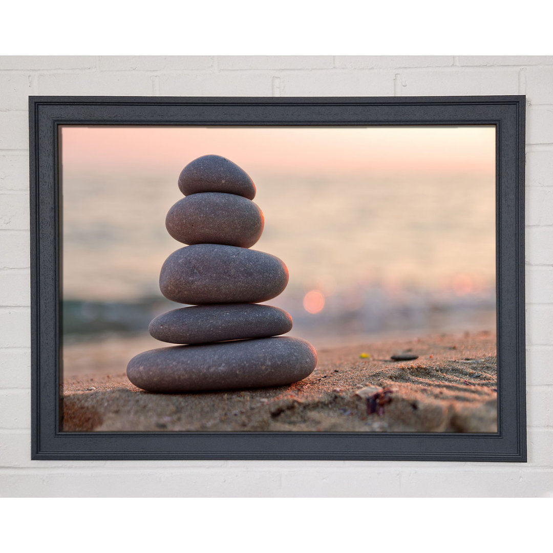 Gerahmter Fotodruck Zen Stones Stacked Up On Beach