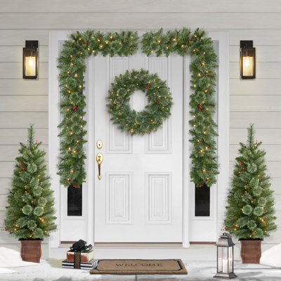 5-Piece Pre-Lit Artificial Christmas Décor Set Featuring 2 Trees, 1 Wreath, and 2 Garland