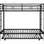Lit simple superposé au-dessus d'un lit gigogne, structure en métal noir, lit gigogne polyvalent relaxant noir, repos pratique-118084421
