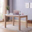 Modern farmhouse dining table with spacious tabletop warm natural and clean white finish seats 4 guests comfortably in kitchen or breakfast room