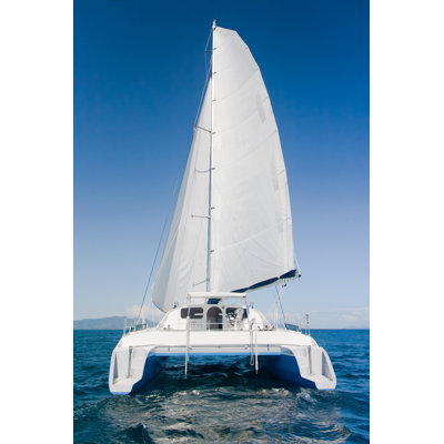 White Sailed Catamaran by Pierivb - Wrapped Canvas Print
