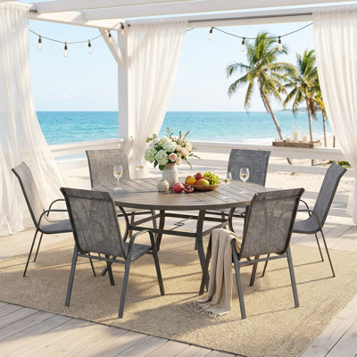 Ensemble de salle à manger de patio rond 6 personnes Edison avec chaises empilables Textilene