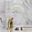 Kingston Brass Kaiser Two-Handle 4-Hole Deck Mount Bridge Kitchen Faucet with Brass Side Sprayer-101180655