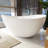 63'' x 37.4'' Freestanding Soaking Solid Surface Bathtub