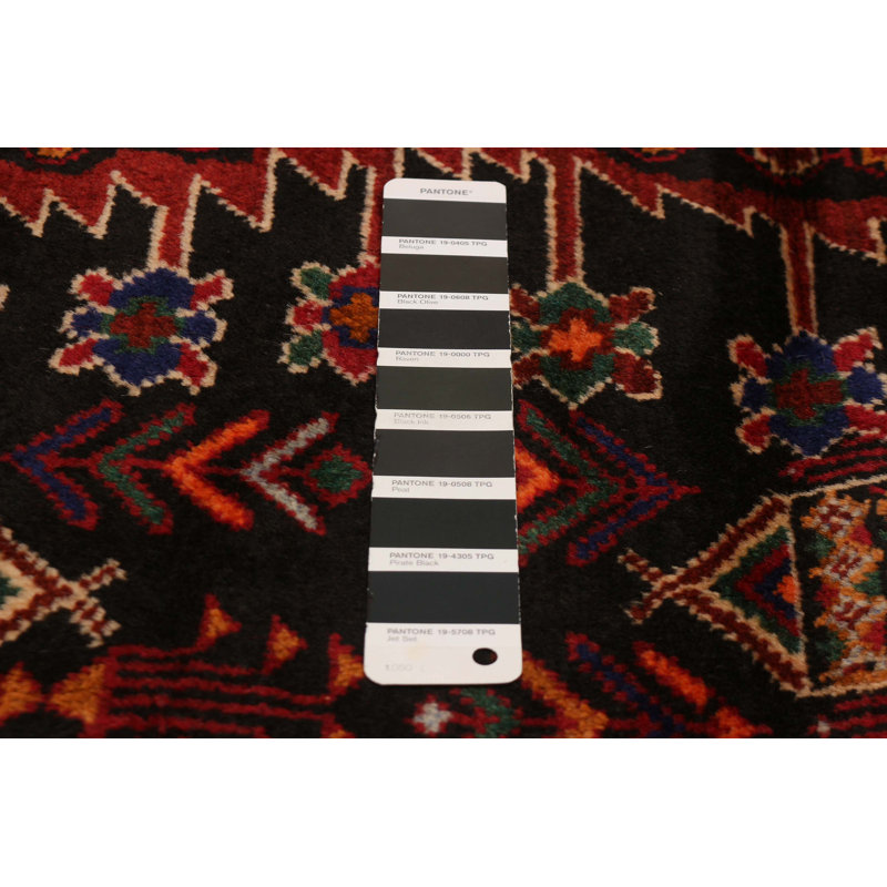 Tapis rectangulaire en laine New Age de conception unique 4 pi 5 po x 7 pi 6 po noir et rouge