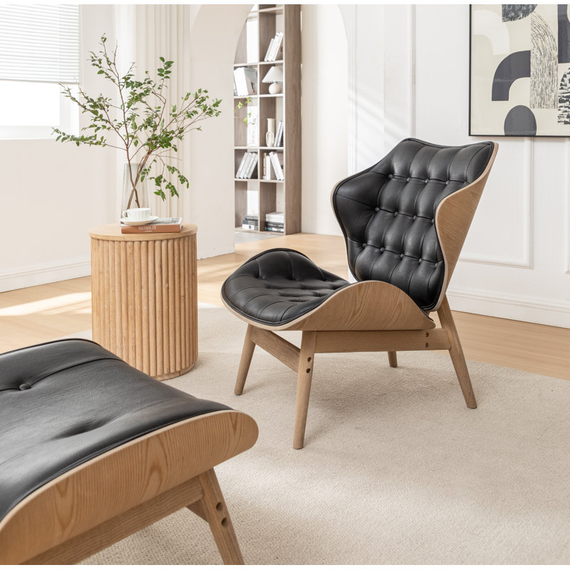 Fauteuil à oreilles capitonné Jeyshan, Similicuir noir