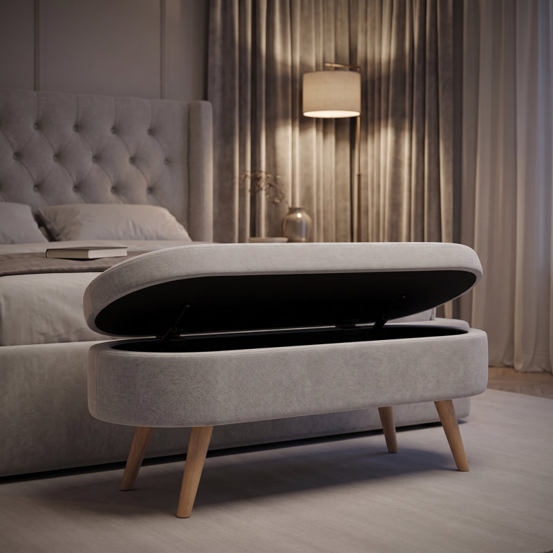 Banc de rangement avec repose-pieds ovale avec revêtement en tissu plissé, pieds en bois d'hévéa et compartiment de rangement caché - repose-pieds polyvalent, sièges supplémentaires et décoration de salon