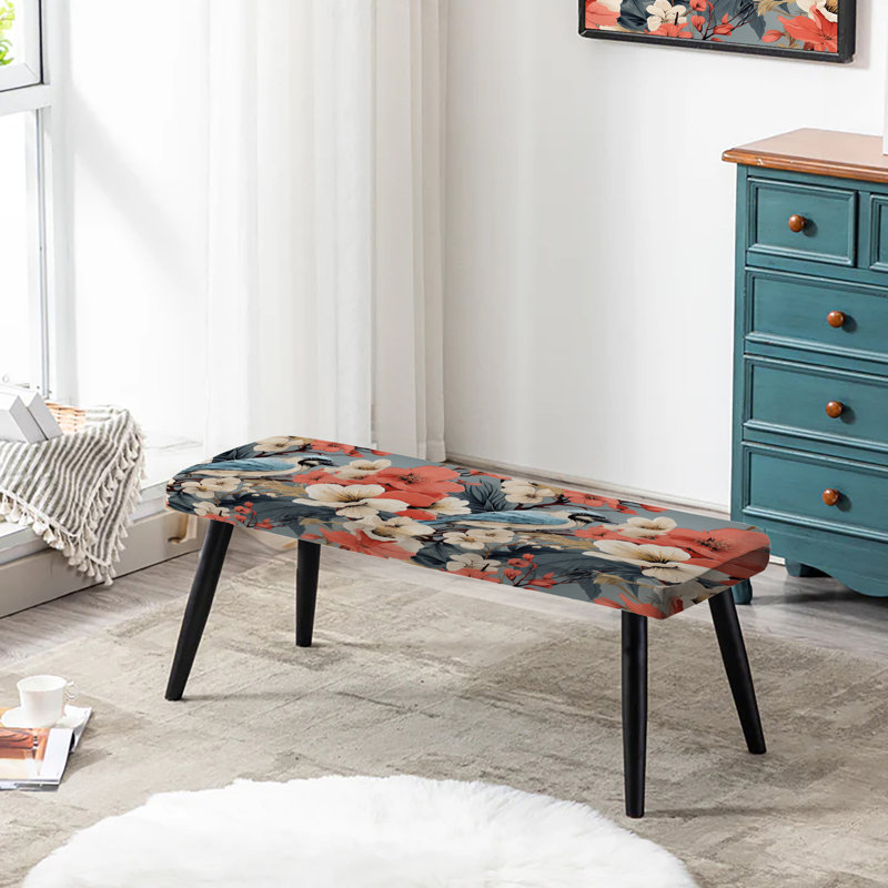 Gris et corail sur un banc floral rembourré noir
