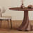 Dark brown interestingly-shaped round table-602394965-602394920