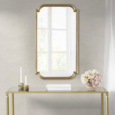 Miroir mural polyvalent festonné à cadre doré pour espaces élégants