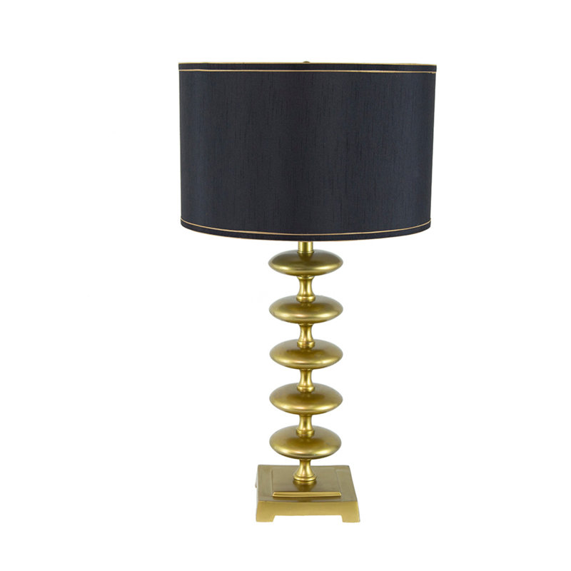 Featuring A Modern Disc-shaped Design, This Black Table Lamp