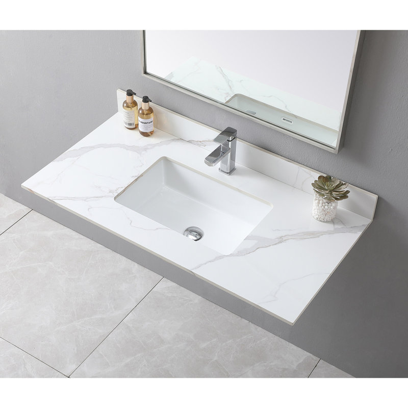 Plateau de meuble-lavabo en pierre frittée haute 43 x 22 avec lavabo rectangulaire en céramique et finition soignée