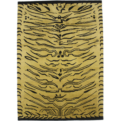 Tapis oriental tribal beige doré