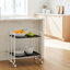 Chariot pliable BAUHAUS – Design moderne, 2 niveaux pratiques avec roulettes, châssis blanc, idéal pour salon, cuisine et patio