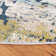Felty Abstract Cream/Blue Area Rug