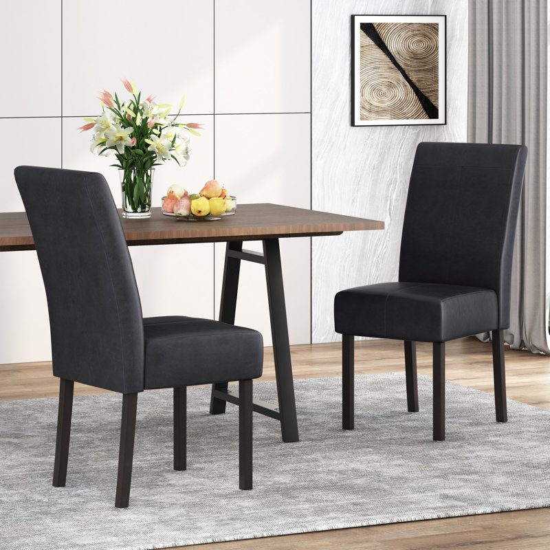 Chaises de salle à manger confortables en cuir PU noir, style moderne pour un usage domestique