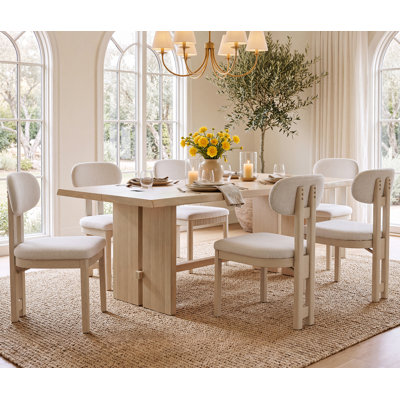 Ensemble de salle à manger moderne 7 pièces de 67 pouces avec 6 chaises de salle à manger rembourrées, plateau de table en placage de bois véritable, pieds de chaise en bois massif, dossiers incurvés, ceintures cannelées et nœud décoratif noir