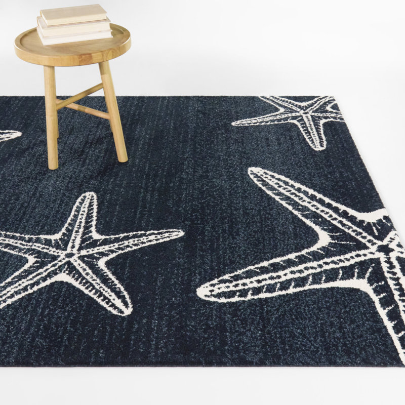Tapis étoile de mer bleu marine Cove