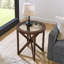Table basse moderne en verre trempé avec base en bois massif, élégante et fonctionnelle pour tout espace.