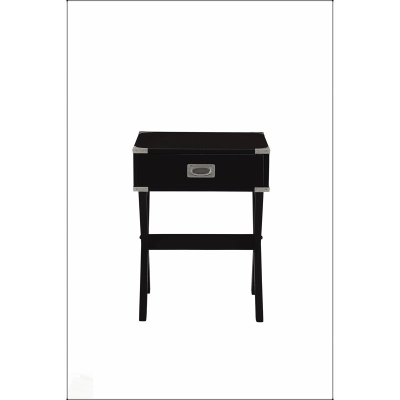 Table d'appoint Babs à finition noire avec tiroir, coins en métal durables et conception compacte pour une utilisation polyvalente dans tout espace de vie.