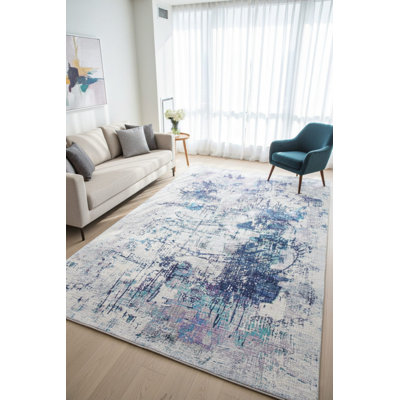 Tapis décoratif rayé gris et bleu