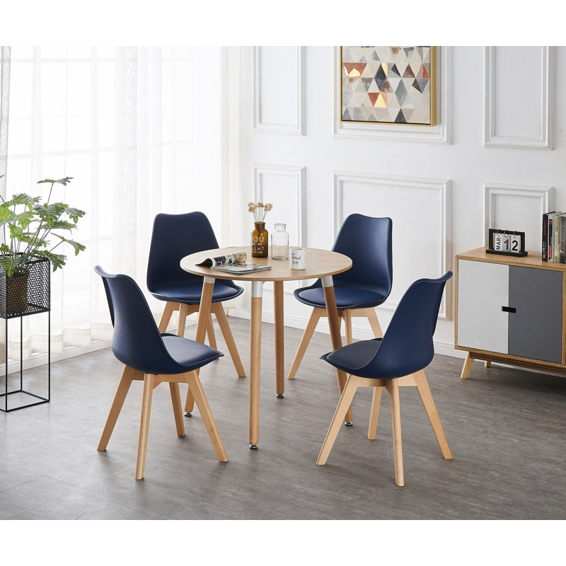 Sade 4 Person Dining Set - a Round Plastic Dining Table with Wooden Legs and a Set of 4 Faux Leather Cushion Padded Dining Chairs for Dining Room - Modern Dining Table Set