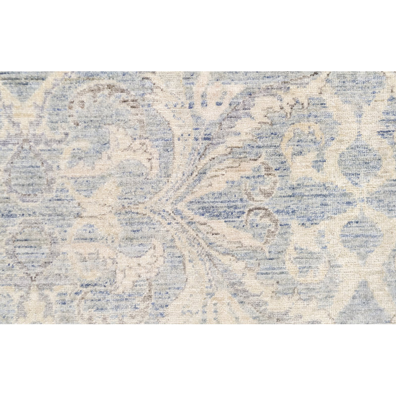 Tapis bleu clair et ivoire noué à la main de haute qualité