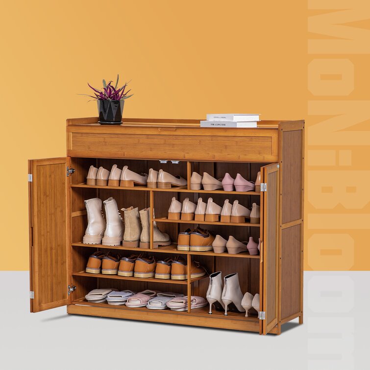 https://assets.wfcdn.com/im/68264176/resize-h755-w755%5Ecompr-r85/2021/202123236/6+Tier+30+Pair+Bamboo+Shoe+Rack+Cabinet+with+Folding+Door%2C+Compartment+Space+for+Boots%2C+for+Home.jpg