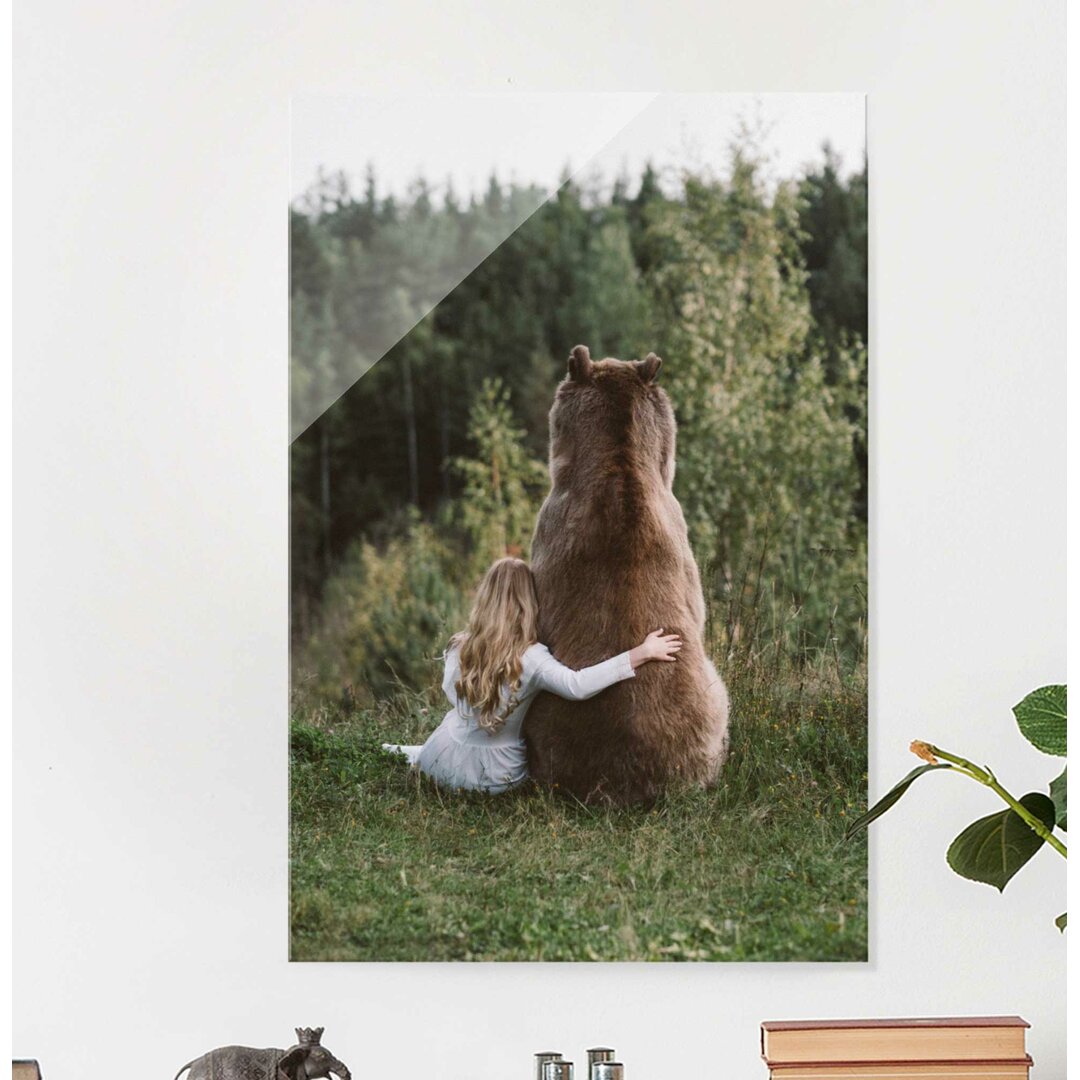 Glasbild Mädchen mit Braunbär